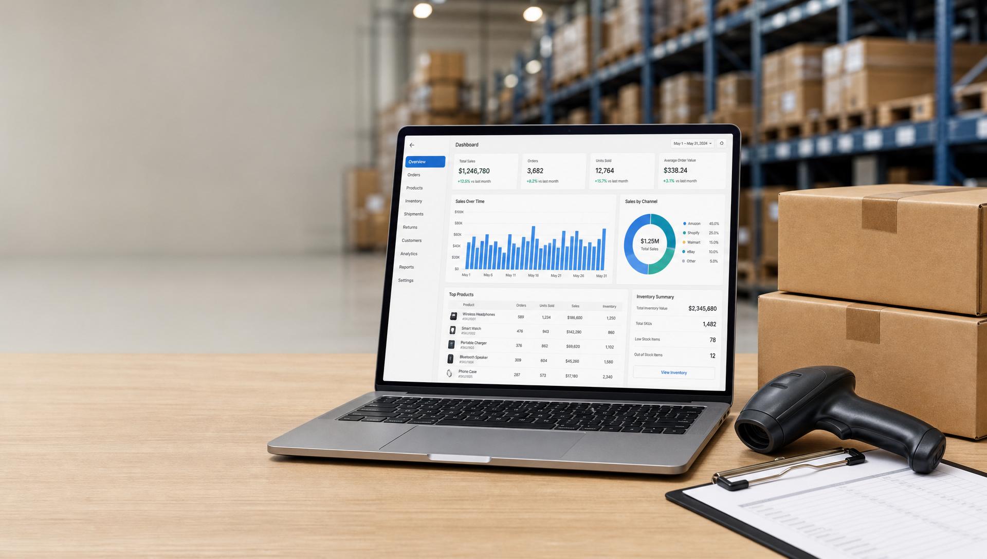 E-commerce fulfillment operations: laptop showing an inventory and marketplace dashboard, stacked shipping boxes, and a handheld barcode scanner on a warehouse workbench
